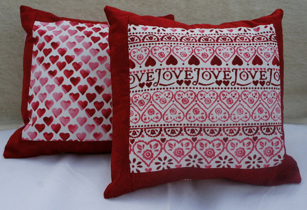 Red and white hearts cushion