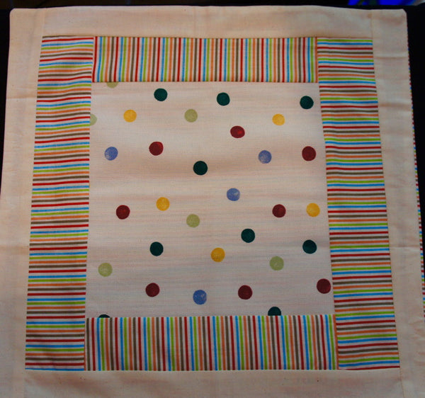 Dots and stripes cushion